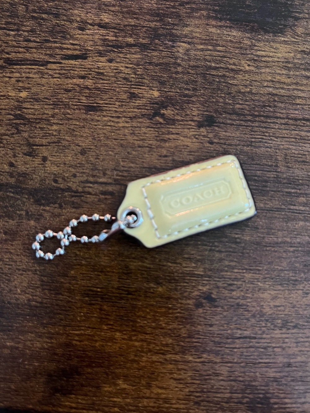 Coach Pale Yellow and white hangtag